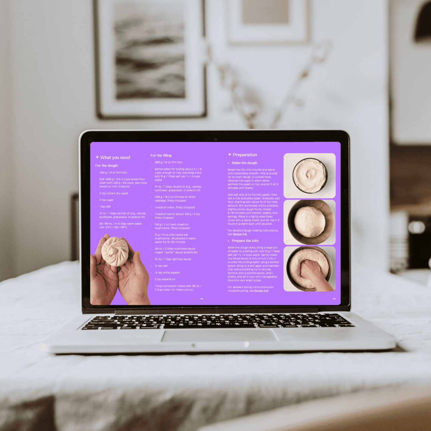 Laptop on a kitchen table displaying tofu mastery book with recipe to follow